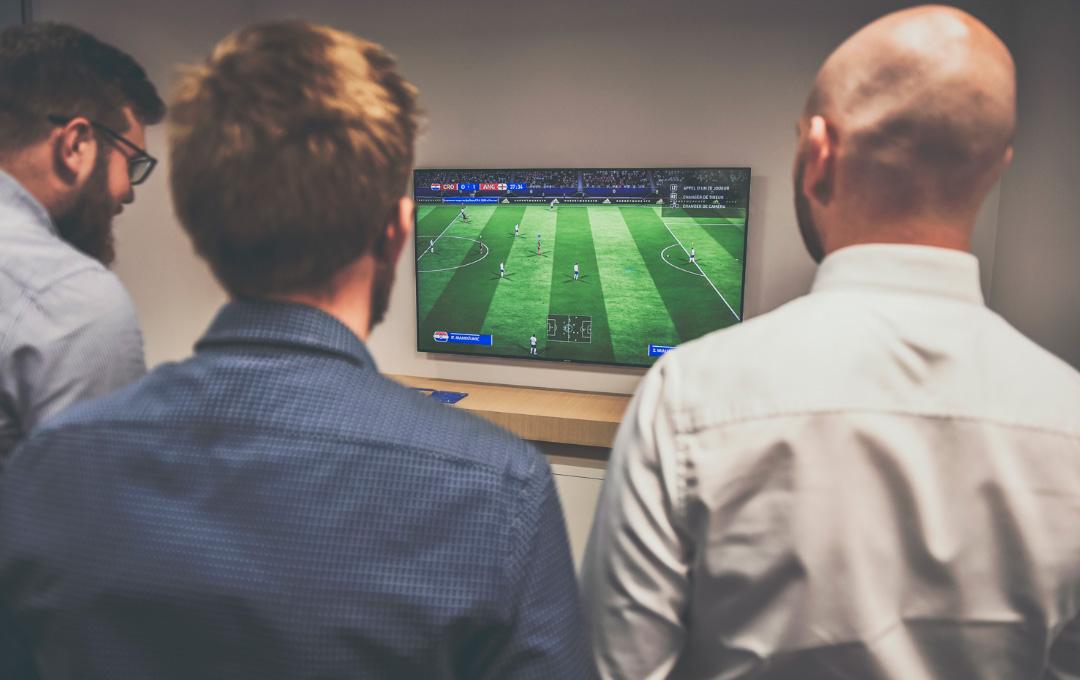 Colleagues playing together at Fifa